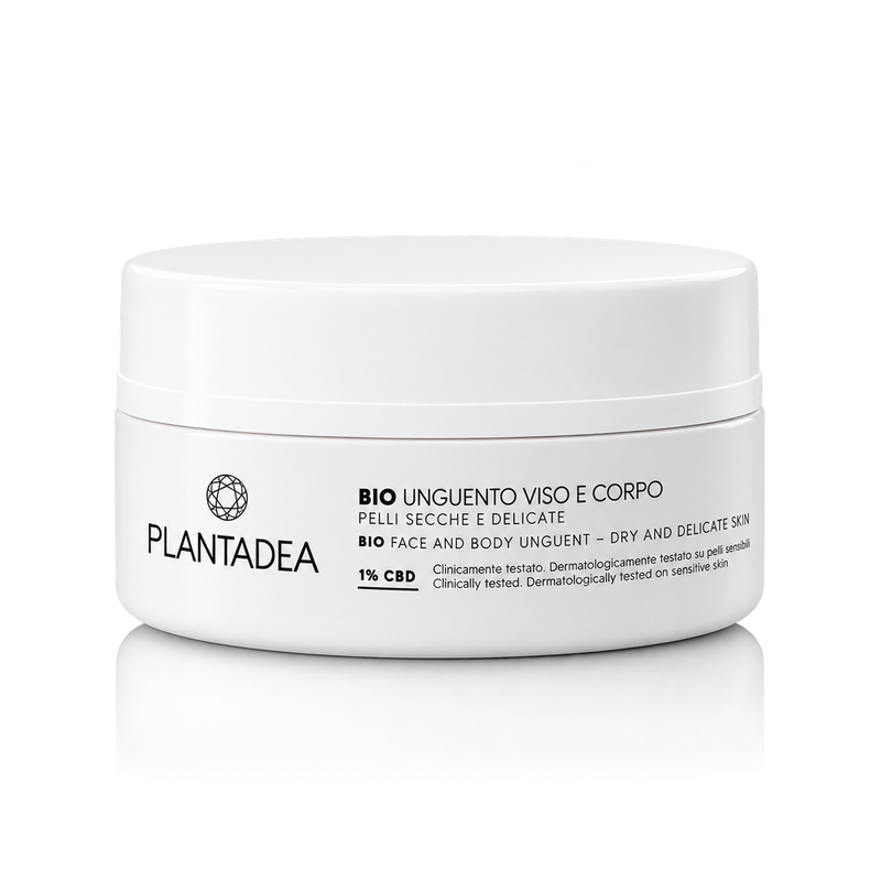Plantadea Bio Unguento Viso e Corpo jar, a white cylindrical container with black text, on a clean white background with a soft reflection.